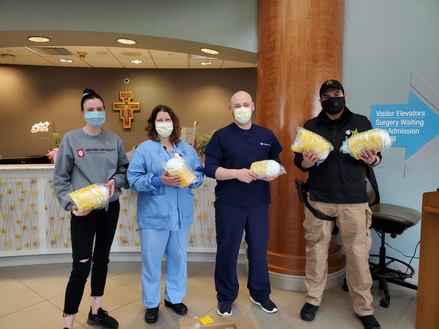 Anna Fenner delivering N95 masks to Franciscan Health Munster