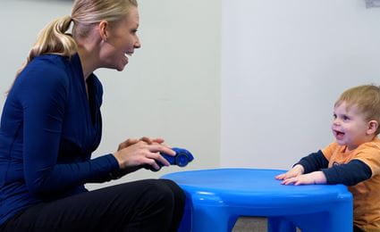 Rebecca McNally Keehn in a early autism evaluation session with a patient