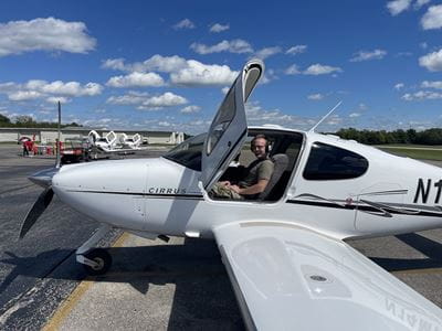 Dr Taylor pilots a small aircraft