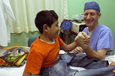 Dr. Martin Kaefer with a patient in Guatemala