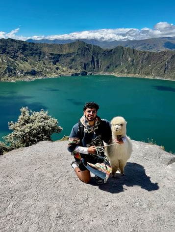 Hugo with an alpaca in Ecuador
