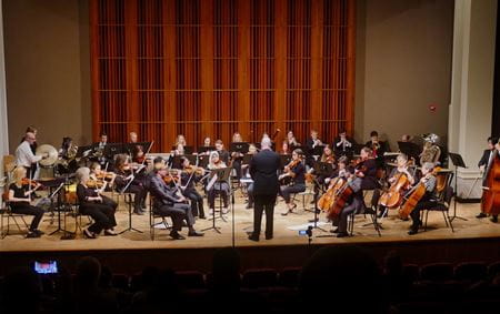 IU School of Medicine Orchestra performing on stage