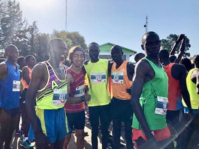 Bilal Jawed with Kenyan runners at a race