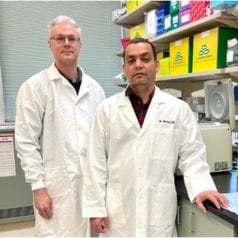 Drs. Herzog and Kumar in the lab