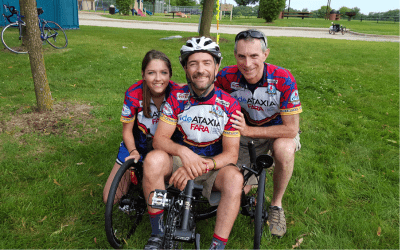 Mark Payne with Kyle Bryant and Emily Young his his left in matching biking attire at a fundraiser benefiting FARA