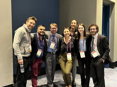 A group of IM residents at a research conference.