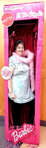 Person in oversized barbie box