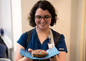 Person looking at donut