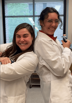 Jamie Felton and Rachel Ramos posing for a photo in the lab