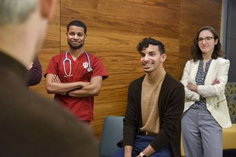 OutCare team members listen to psychiatry resident, Dustin Nowaskie, MD. From left to right, Jordan Nowaskie, Jared Riley, Abby Hadley and Christopher Roman.