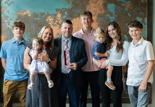 Dr. Troy A. Markel with his wife Sarah and children: Kayla (24), Austin (17), Thomas (17), Owen (15), Mason (13), Bentley (2), and Thea (1). 