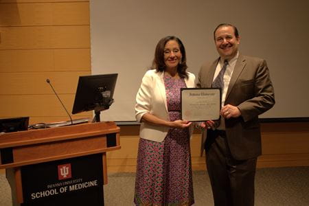 Dr. Haas presents Dr. Mallett with the Hunter Lecturer award