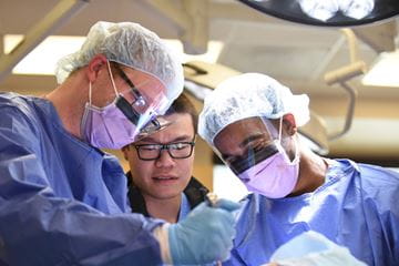 residents working in a surgical skills lab